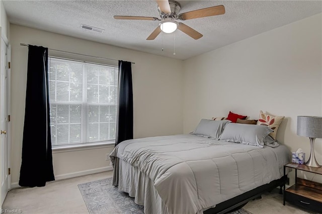 4317 Bradbury Way, High Point, NC 27265 - bedroom with light colored carpet, a textured ceiling, and ceiling fan