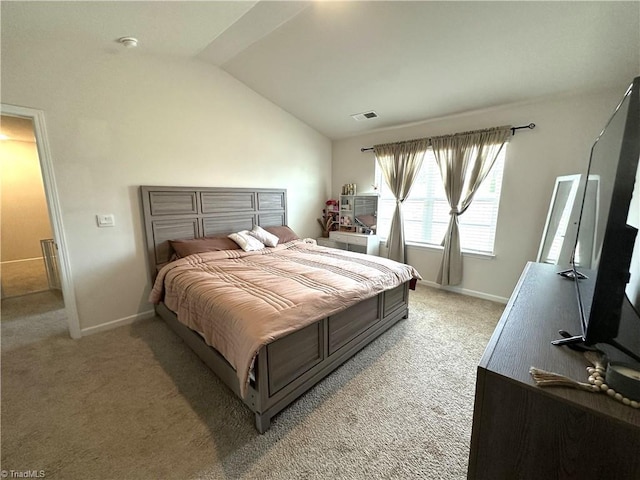 bedroom with visible vents, baseboards, vaulted ceiling, and light carpet