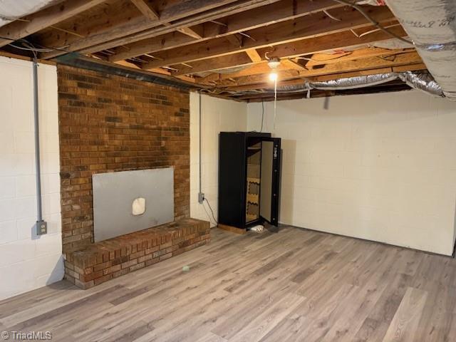 unfinished basement featuring wood finished floors