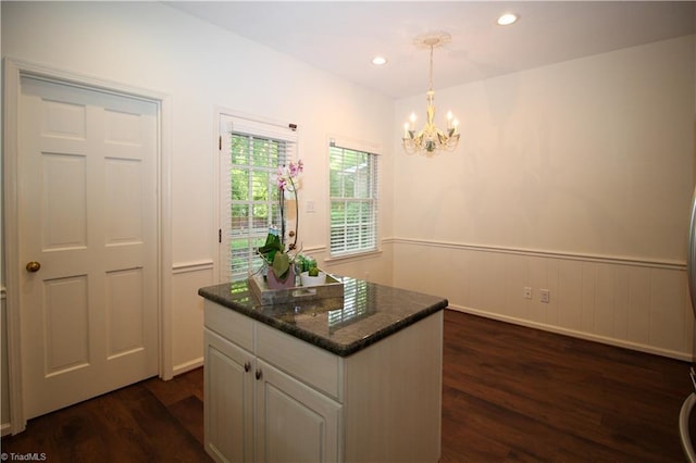 39 Fountain Manor Dr Unit A, Greensboro, NC 27405 - kitchen featuring dark wood-type flooring, a chandelier, a center island, a wainscoted wall, and recessed lighting