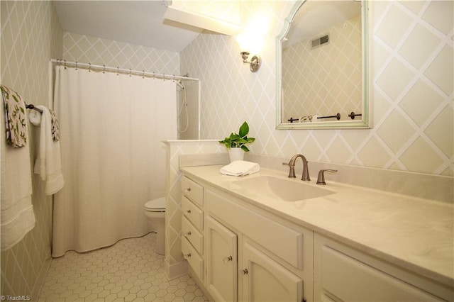 39 Fountain Manor Dr Unit A, Greensboro, NC 27405 - full bathroom featuring toilet, vanity, a shower with curtain, tile patterned flooring, and wallpapered walls
