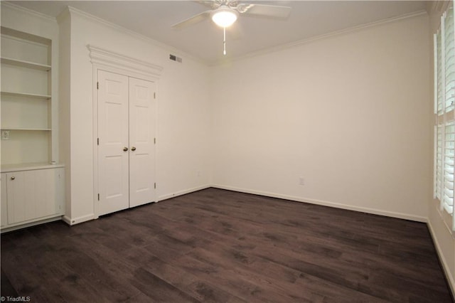 39 Fountain Manor Dr Unit A, Greensboro, NC 27405 - unfurnished bedroom with ornamental molding, dark wood finished floors, baseboards, and ceiling fan