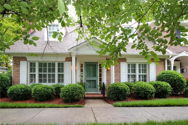 39 Fountain Manor Dr Unit A, Greensboro, NC 27405 - view of front facade featuring brick siding and a shingled roof