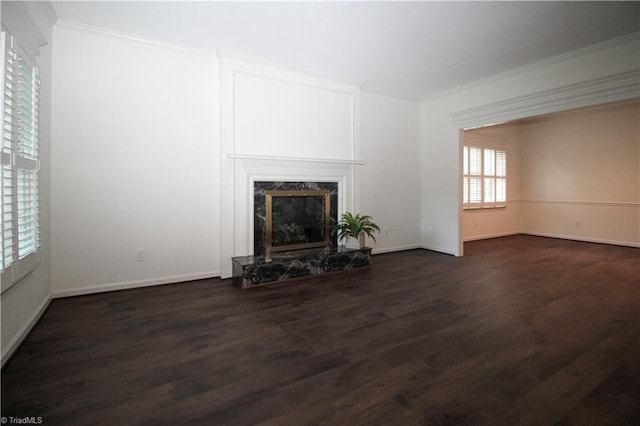 39 Fountain Manor Dr Unit A, Greensboro, NC 27405 - unfurnished living room with wood finished floors, ornamental molding, a fireplace, and baseboards