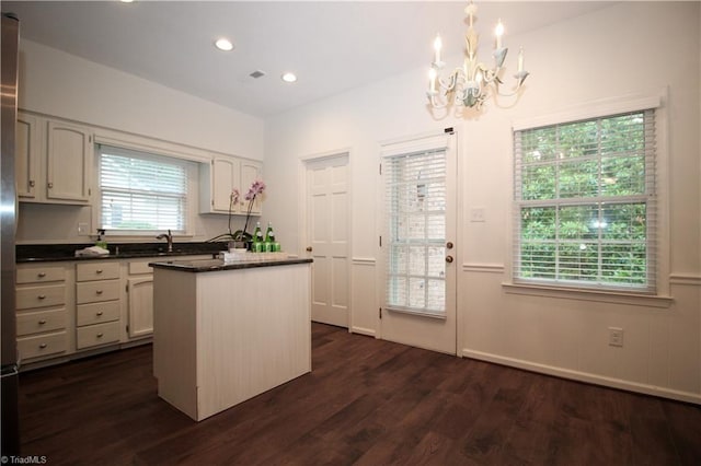 39 Fountain Manor Dr Unit A, Greensboro, NC 27405 - kitchen featuring dark countertops, a chandelier, dark wood-style floors, recessed lighting, and a center island