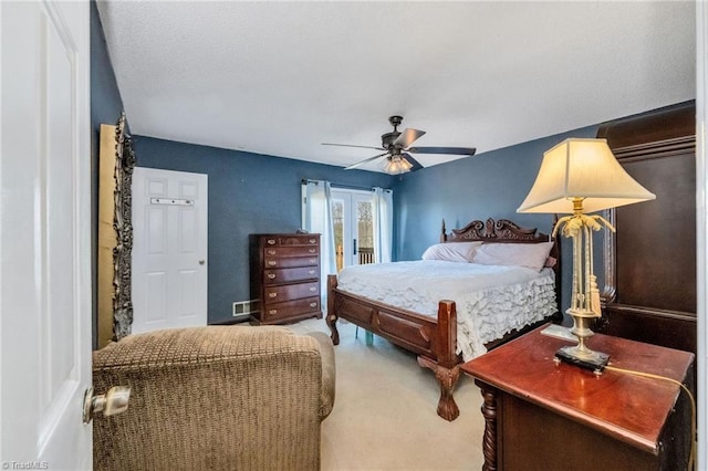 carpeted bedroom with a ceiling fan
