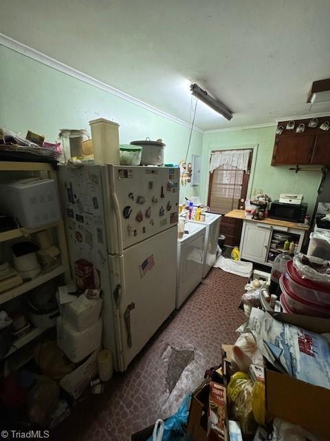 kitchen with washer / clothes dryer, ornamental molding, electric panel, and white refrigerator