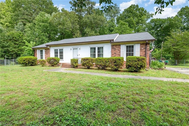 6215 Russwood Dr, Pleasant Garden, NC 27313 - single story home featuring brick siding