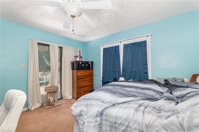 6215 Russwood Dr, Pleasant Garden, NC 27313 - bedroom featuring light colored carpet, a ceiling fan, and access to exterior
