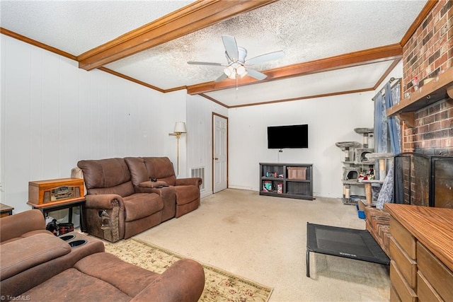 6215 Russwood Dr, Pleasant Garden, NC 27313 - carpeted living room featuring beam ceiling, a ceiling fan, crown molding, and a textured ceiling