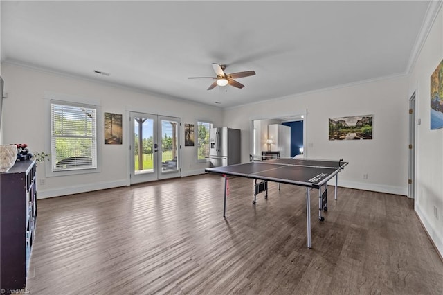 601 Rachel Smothers Dr, Greensboro, NC 27455 - recreation room with wood finished floors, ceiling fan, ornamental molding, french doors, and baseboards