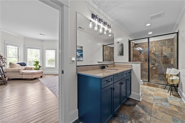 601 Rachel Smothers Dr, Greensboro, NC 27455 - bathroom with ornamental molding, a stall shower, vanity, recessed lighting, and baseboards