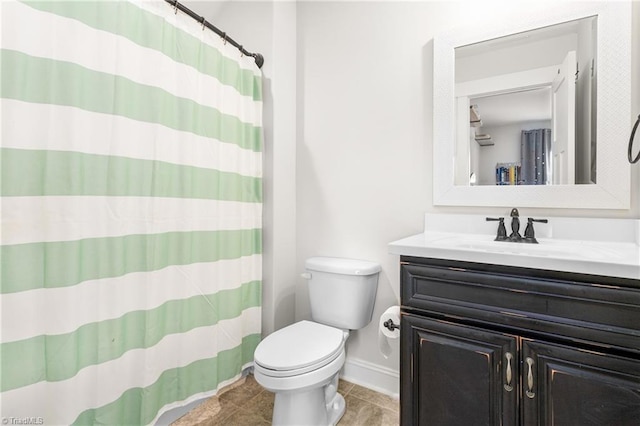 bathroom with toilet, tile patterned flooring, a shower with shower curtain, and vanity