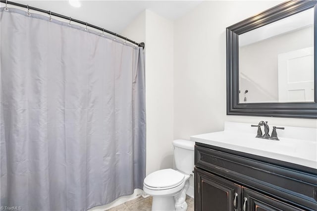 full bath with vanity and toilet