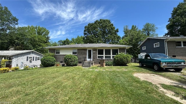 4205 Kildare Dr, Greensboro, NC 27405 - view of front of home featuring a front lawn and brick siding