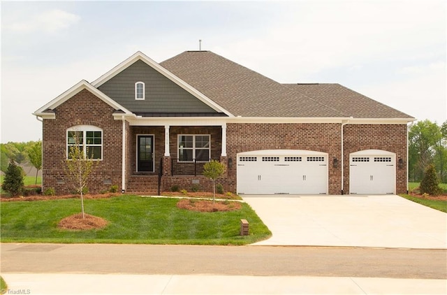8124 Simon Dr Lot 48, Stokesdale, NC 27357 - view of front of property with a garage, brick siding, driveway, a front lawn, and covered porch