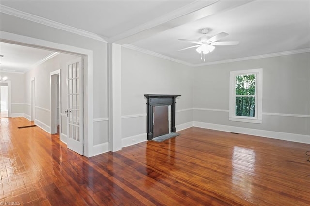 unfurnished living room with hardwood / wood-style flooring, ceiling fan with notable chandelier, and ornamental molding