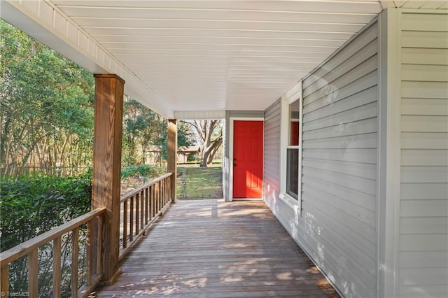 wooden deck featuring covered porch