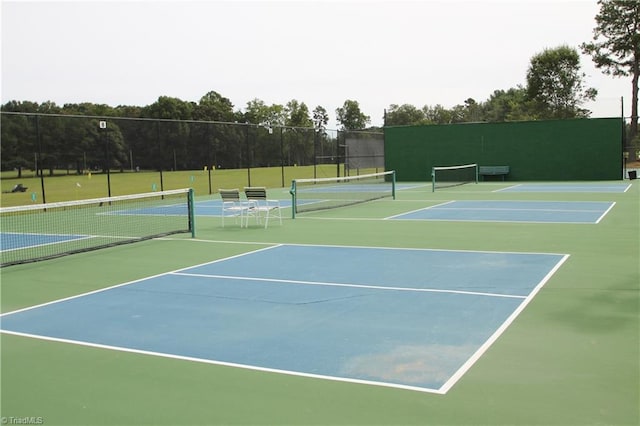 view of sport court featuring community basketball court and fence