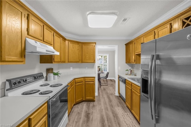 kitchen with stainless steel fridge, light wood finished floors, dishwasher, under cabinet range hood, and range with electric stovetop