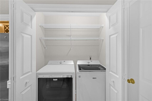 laundry area with laundry area and washing machine and dryer