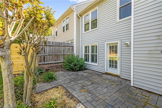 view of patio / terrace featuring fence