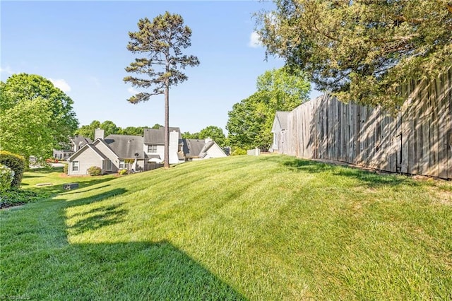 view of yard with fence
