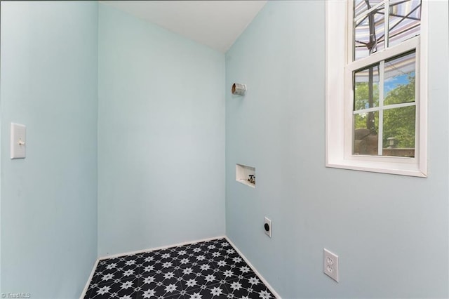 1607 Belmont St, Burlington, NC 27215 - laundry area with tile patterned floors, electric dryer hookup, and washer hookup