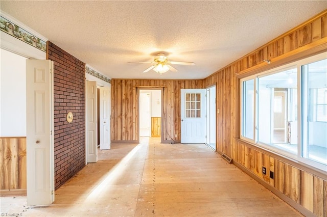 interior space featuring ceiling fan