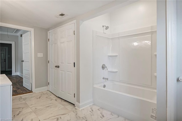 bathroom with vanity and bathing tub / shower combination