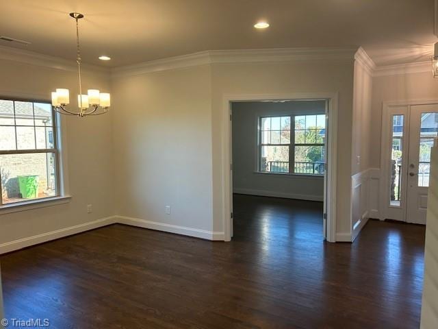 interior space featuring a notable chandelier, plenty of natural light, and dark wood-type flooring