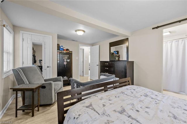 bedroom with light hardwood / wood-style floors