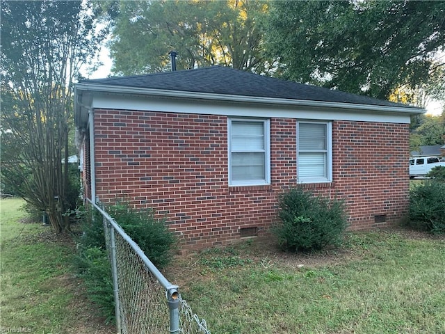 view of property exterior featuring a yard