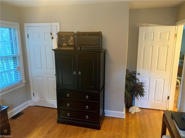 interior details featuring hardwood / wood-style floors