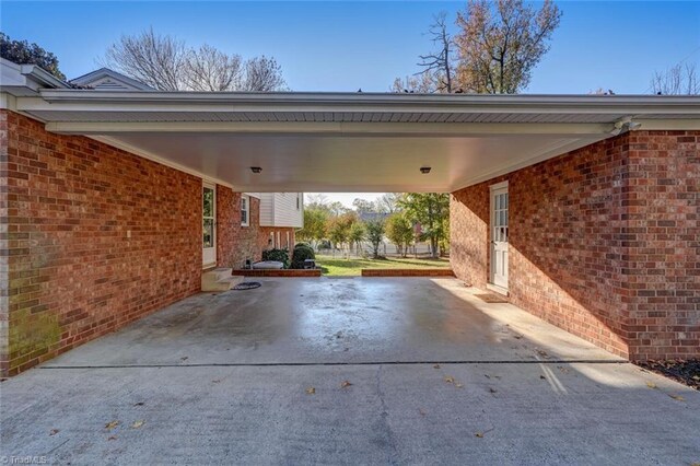 view of patio / terrace featuring a carport