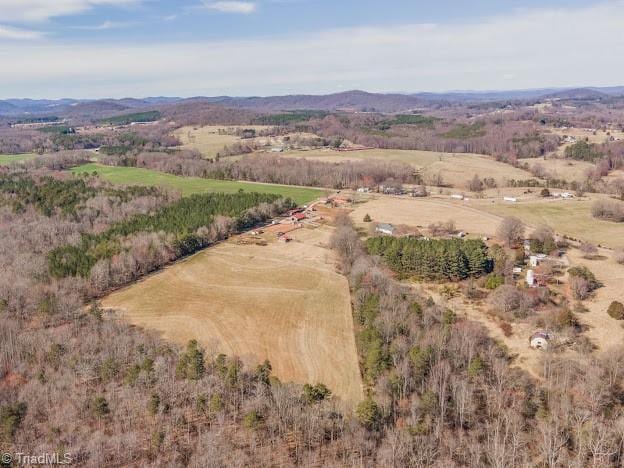 birds eye view of property featuring a rural view