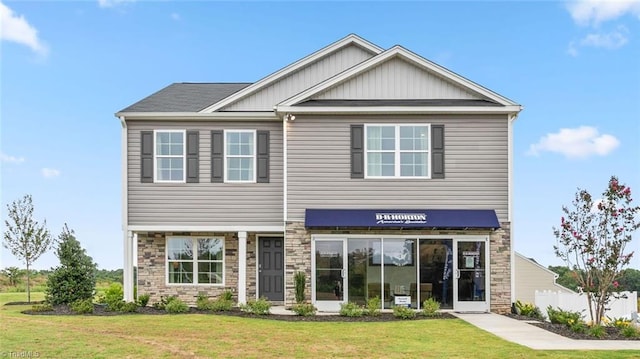 818 Merriweather Dr, King, NC 27021 - view of front facade with stone siding and a front lawn