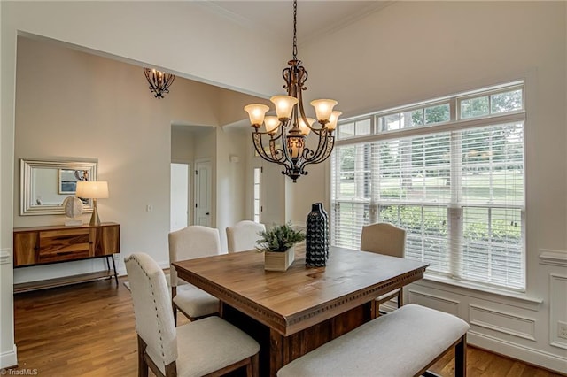 3001 Walbrook Ter, Browns Summit, NC 27214 - dining space featuring a chandelier, light wood-style flooring, and ornamental molding