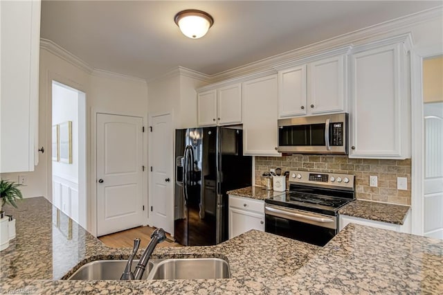 3001 Walbrook Ter, Browns Summit, NC 27214 - kitchen featuring appliances with stainless steel finishes, a sink, stone counters, white cabinets, and crown molding