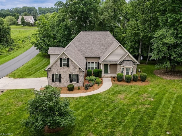 3001 Walbrook Ter, Browns Summit, NC 27214 - craftsman house featuring brick siding, a front lawn, and roof with shingles
