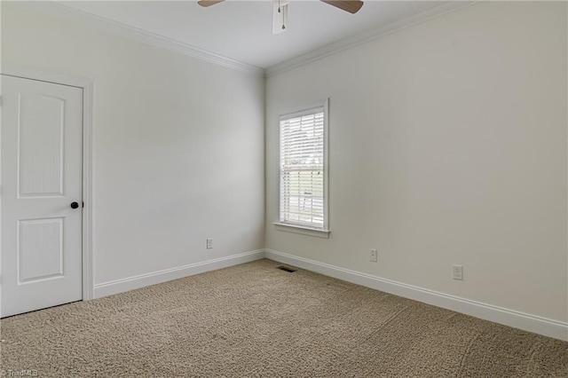 3001 Walbrook Ter, Browns Summit, NC 27214 - carpeted spare room featuring a ceiling fan, baseboards, and ornamental molding