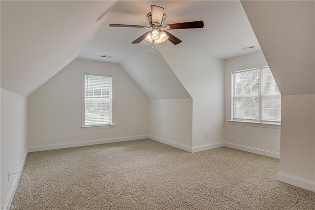 3001 Walbrook Ter, Browns Summit, NC 27214 - bonus room featuring carpet, lofted ceiling, baseboards, and ceiling fan