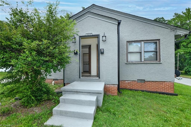 1017 Logan St Unit 2, Greensboro, NC 27406 - entrance to property with a yard and crawl space