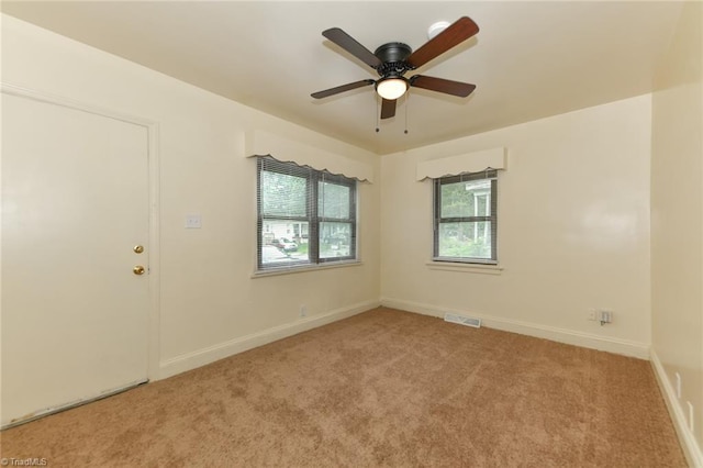 1017 Logan St Unit 2, Greensboro, NC 27406 - unfurnished room featuring carpet floors, ceiling fan, and baseboards