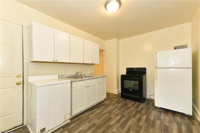 1017 Logan St Unit 2, Greensboro, NC 27406 - kitchen with freestanding refrigerator, black electric range oven, washer / dryer, a sink, and dark wood-style flooring