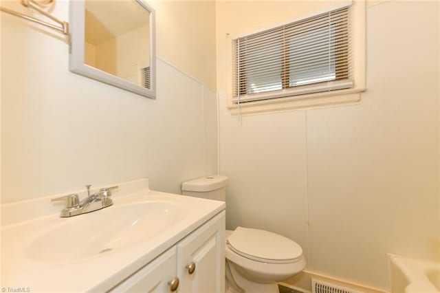 1017 Logan St Unit 2, Greensboro, NC 27406 - bathroom featuring toilet, vanity, and a bathtub