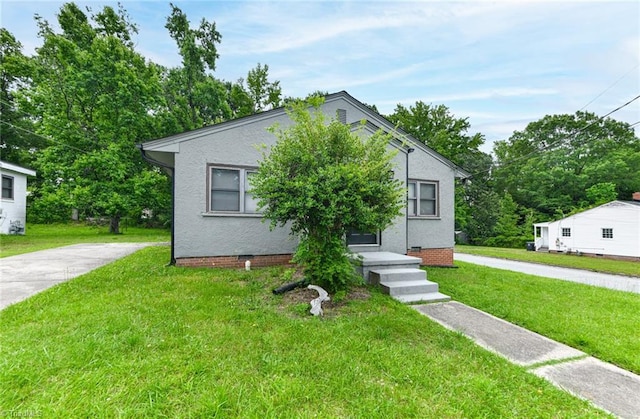 1017 Logan St Unit 2, Greensboro, NC 27406 - view of front of home featuring a front lawn