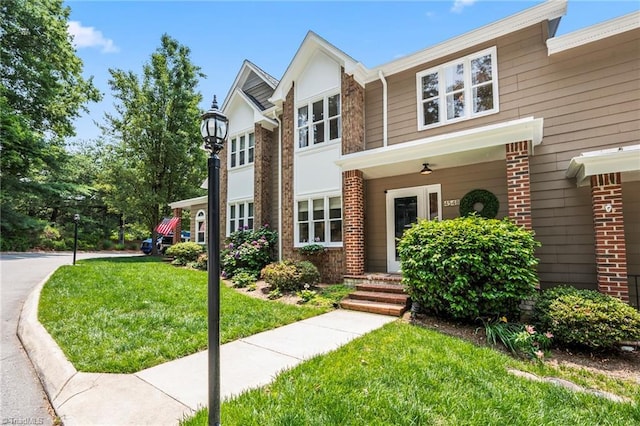 4548 Fernhaven Cir, Winston-Salem, NC 27104 - view of front facade featuring brick siding and a front yard