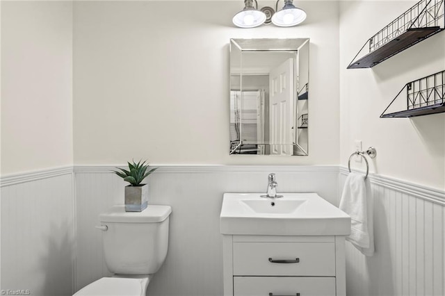 4548 Fernhaven Cir, Winston-Salem, NC 27104 - half bath with wainscoting, toilet, and vanity