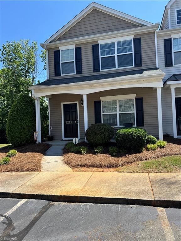 7213 Olmstead Dr, Burlington, NC 27215 - view of front of house featuring covered porch